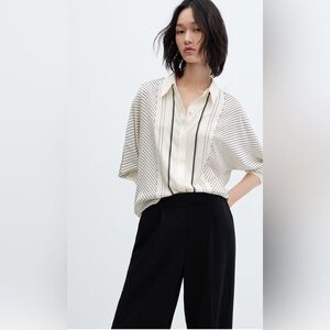 Worn Once MNG Size 4 Women’s Polyester button up white and black shirt